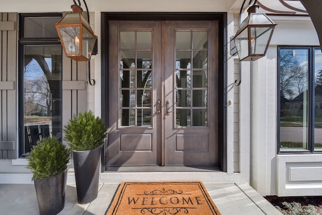 view of exterior entry featuring french doors