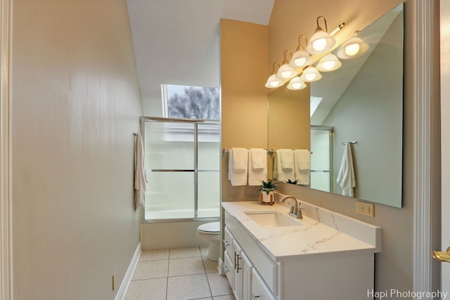 full bath with tile patterned floors, toilet, combined bath / shower with glass door, baseboards, and vanity