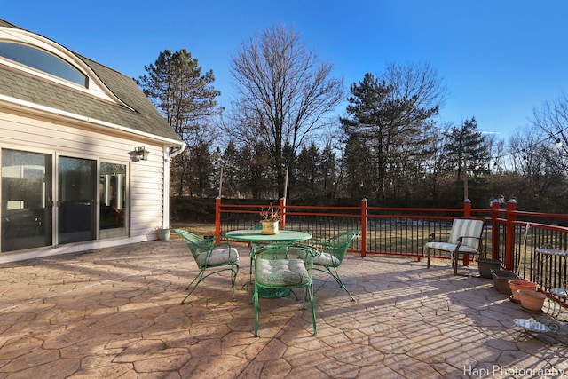 deck with a patio and outdoor dining space