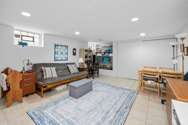 living room featuring light tile patterned flooring and recessed lighting