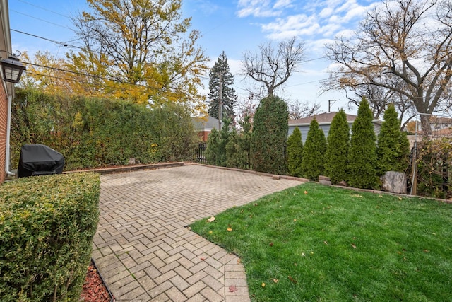 view of patio with a grill