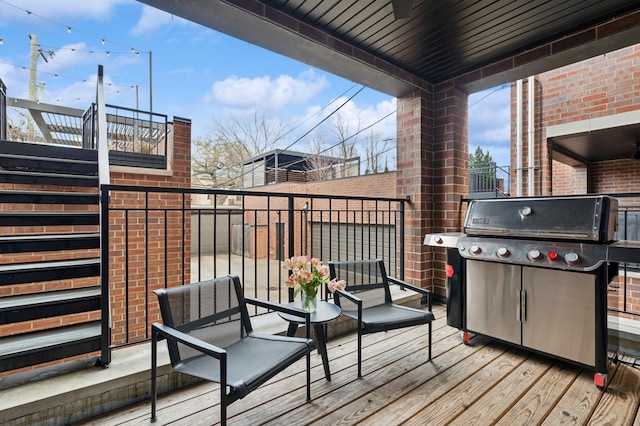 wooden deck with area for grilling