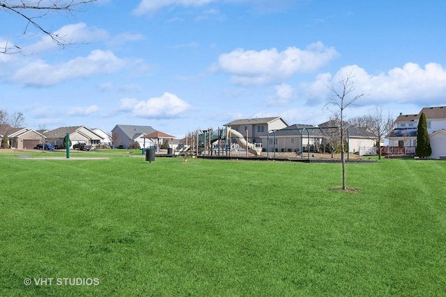 view of yard with playground community and a residential view