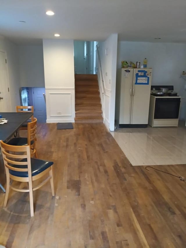 5348 S Peoria St, Chicago, IL 60609 - kitchen with white appliances, wood finished floors, and recessed lighting