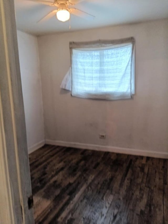 5348 S Peoria St, Chicago, IL 60609 - unfurnished room featuring plenty of natural light, wood finished floors, and a ceiling fan
