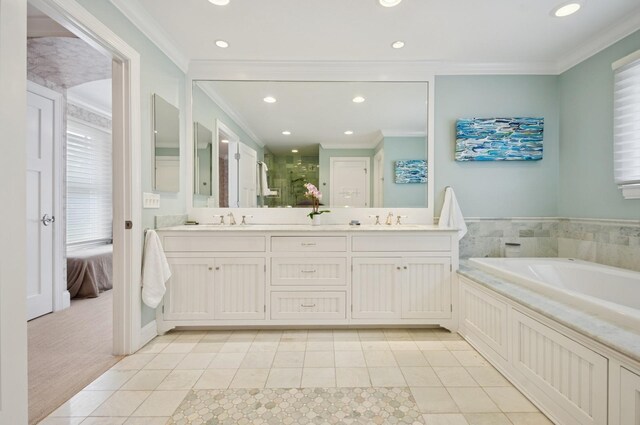 384 Provident Ave, Winnetka, IL 60093 - full bathroom featuring tile patterned flooring, crown molding, recessed lighting, double vanity, and a garden tub