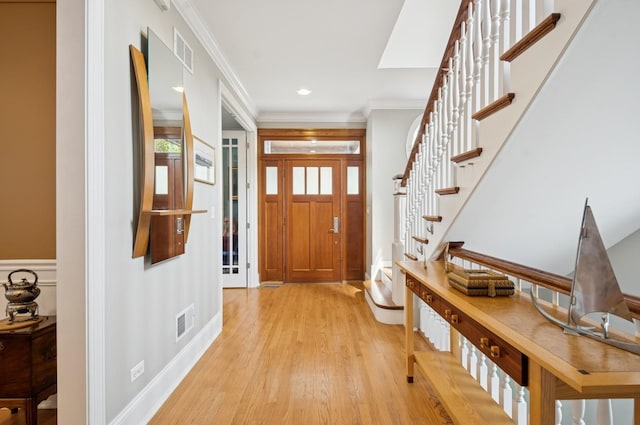 384 Provident Ave, Winnetka, IL 60093 - foyer with light wood finished floors, stairway, ornamental molding, recessed lighting, and baseboards