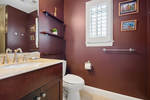 384 Provident Ave, Winnetka, IL 60093 - bathroom featuring toilet, baseboards, and vanity