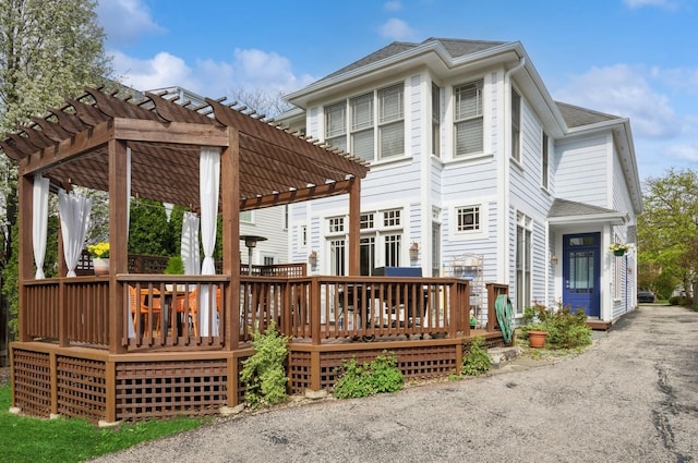 384 Provident Ave, Winnetka, IL 60093 - back of house with a pergola, a wooden deck, and a shingled roof