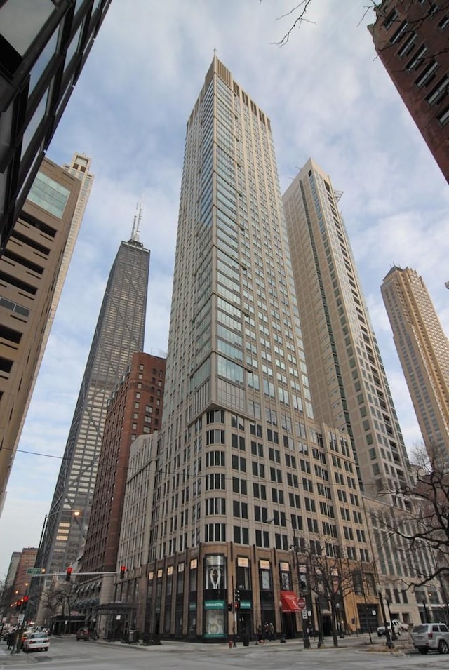 view of building exterior featuring a city view