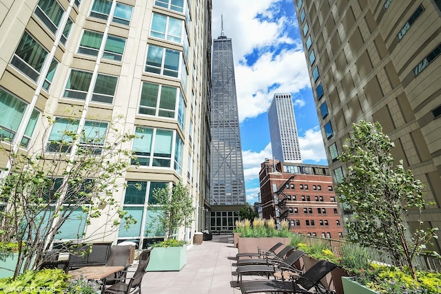 view of building exterior featuring a view of city