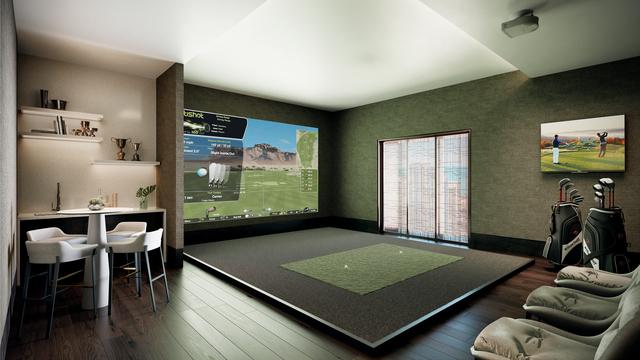 recreation room with a healthy amount of sunlight, golf simulator, and dark wood-type flooring