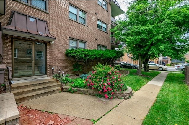 view of home's community with entry steps