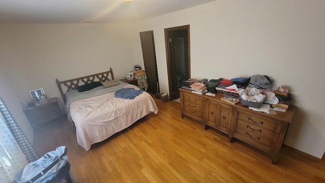 bedroom with light wood-style flooring