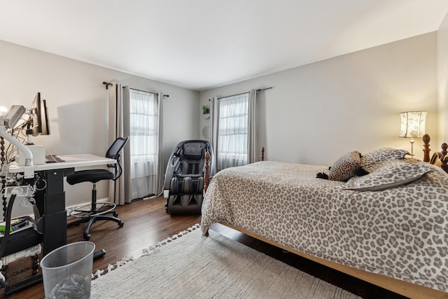 bedroom featuring wood finished floors