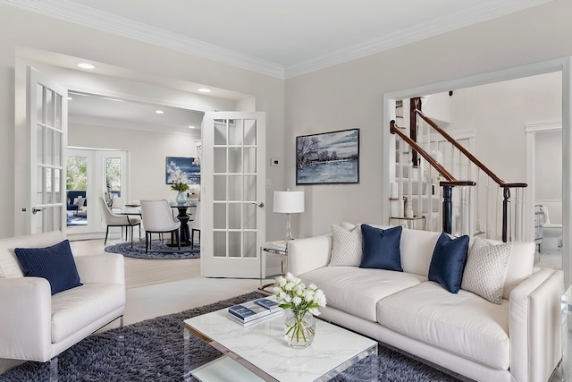 living area featuring ornamental molding, recessed lighting, french doors, and stairs