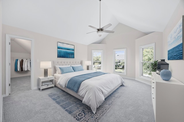 bedroom with carpet floors, baseboards, a ceiling fan, and lofted ceiling