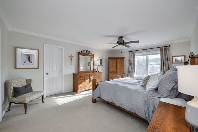 bedroom with crown molding, carpet, and ceiling fan