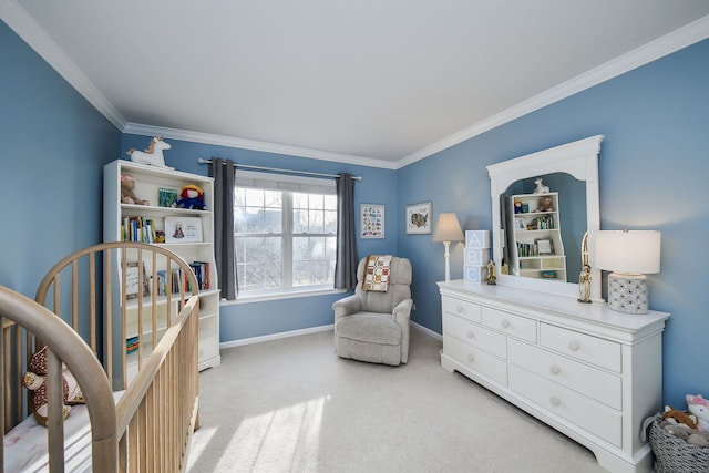 bedroom with a crib, crown molding, baseboards, and carpet floors