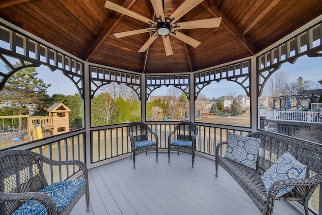 deck with a gazebo and outdoor lounge area