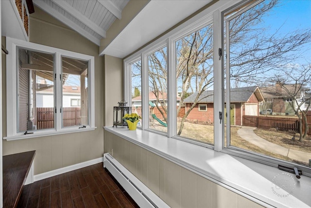 unfurnished sunroom with lofted ceiling with beams