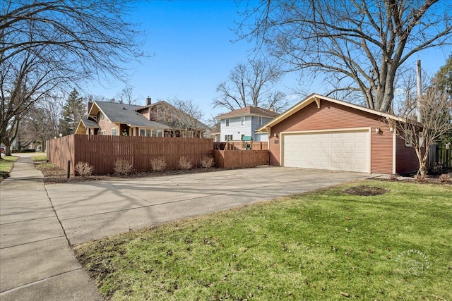 view of property exterior featuring a yard and a fenced front yard