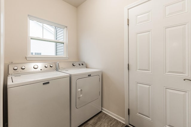 1125 Juniper Dr, Sycamore, IL 60178 - clothes washing area with washing machine and clothes dryer and baseboards