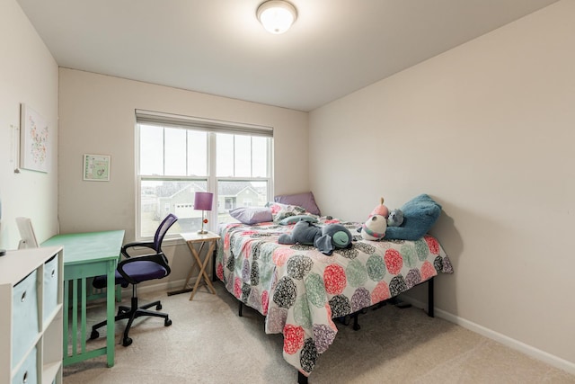 1125 Juniper Dr, Sycamore, IL 60178 - carpeted bedroom featuring baseboards and an office area