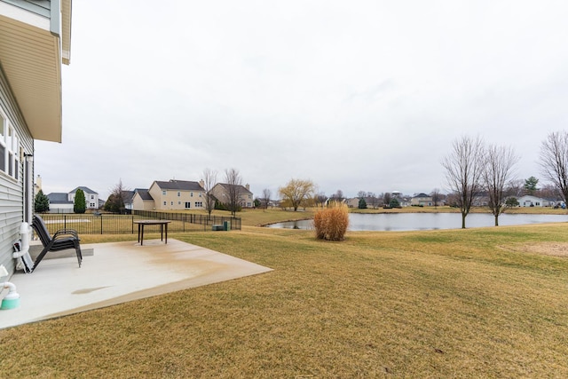 1125 Juniper Dr, Sycamore, IL 60178 - view of yard featuring a patio area, a water view, and a residential view