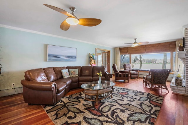 2115 N Woodlawn Park Ave, Mchenry, IL 60051 - living area with a baseboard heating unit, wood finished floors, ornamental molding, and ceiling fan