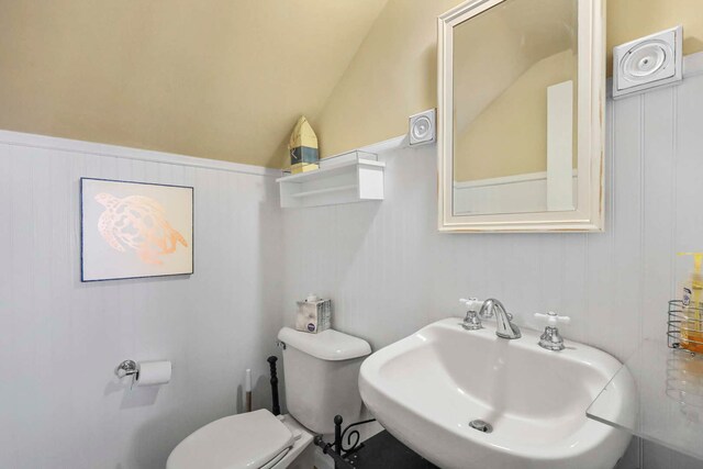 2115 N Woodlawn Park Ave, Mchenry, IL 60051 - half bath with toilet, a sink, and vaulted ceiling