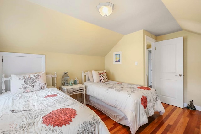 2115 N Woodlawn Park Ave, Mchenry, IL 60051 - bedroom with vaulted ceiling and wood finished floors