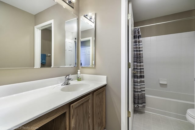 full bath featuring toilet, vanity, and shower / tub combo with curtain