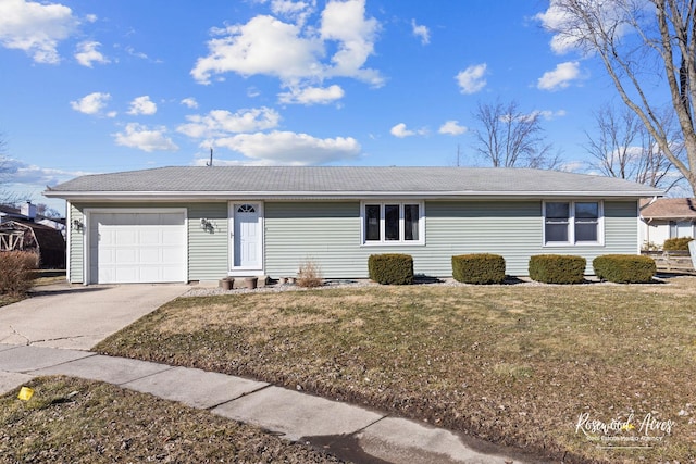 ranch-style house featuring a garage, concrete driveway, and a front lawn