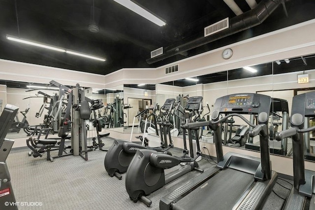 exercise room featuring visible vents