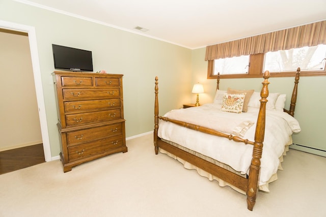 bedroom with light carpet, visible vents, baseboards, a baseboard radiator, and crown molding