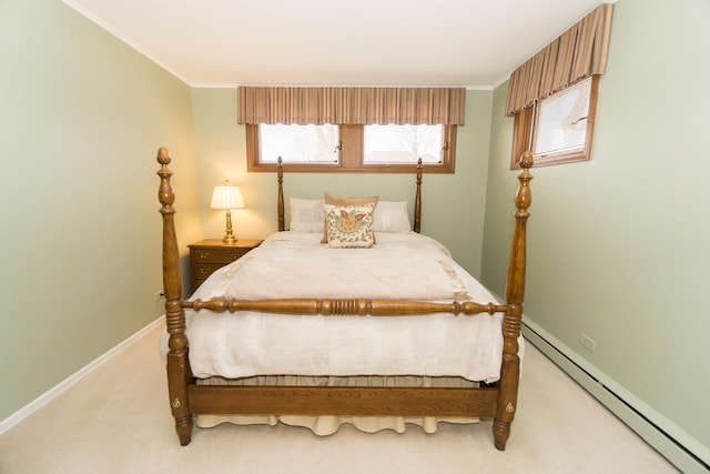 bedroom featuring a baseboard radiator, light colored carpet, crown molding, and baseboards