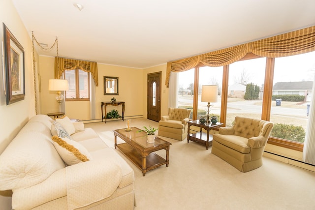 carpeted living room featuring baseboard heating