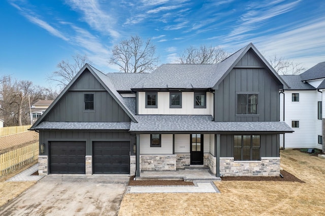 modern inspired farmhouse featuring board and batten siding and roof with shingles