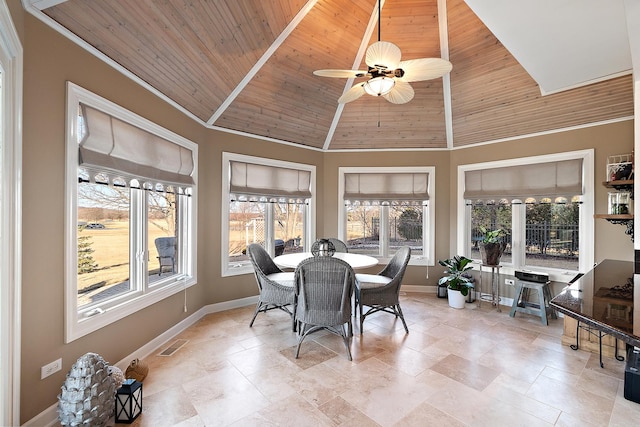 sunroom featuring visible vents, wood ceiling, ceiling fan, and vaulted ceiling