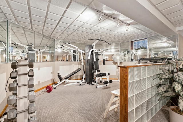 exercise room with baseboards