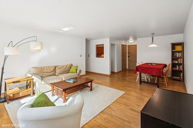 living room with light wood-style floors