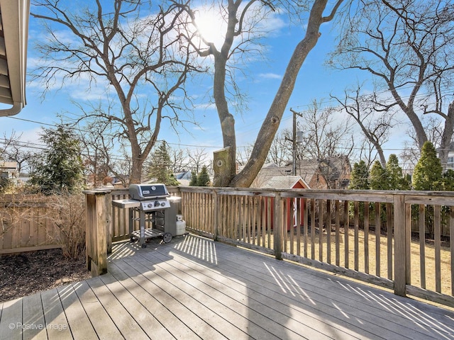 wooden deck featuring grilling area