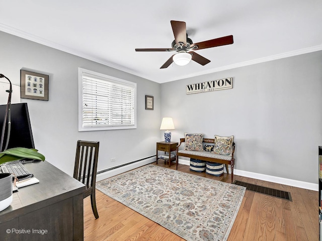 home office with a ceiling fan, wood finished floors, baseboards, ornamental molding, and baseboard heating