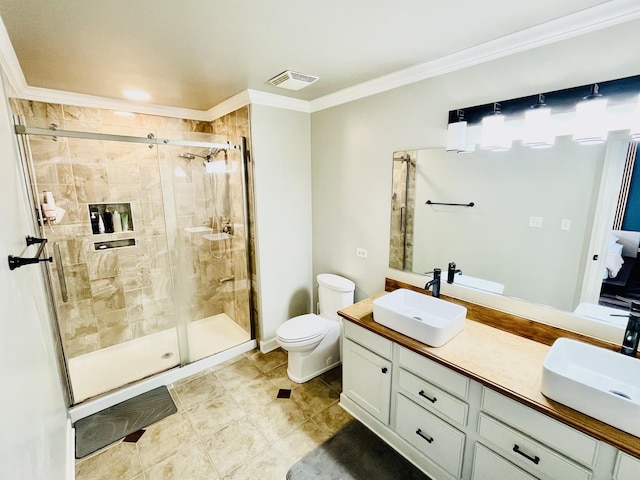 bathroom with a stall shower, visible vents, and a sink