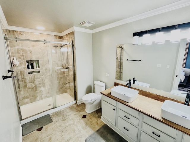 bathroom featuring ornamental molding, a sink, visible vents, and a shower stall