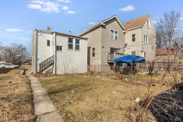 6725 S Justine St, Chicago, IL 60636 - rear view of house featuring stairway
