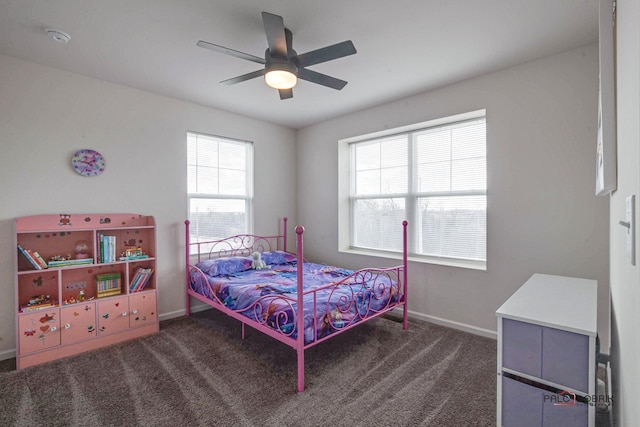 bedroom featuring baseboards, carpet, and a ceiling fan