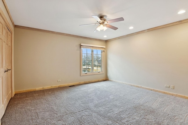 unfurnished room featuring crown molding, baseboards, carpet floors, recessed lighting, and a ceiling fan