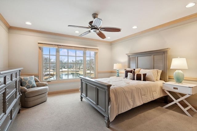 carpeted bedroom featuring crown molding and recessed lighting